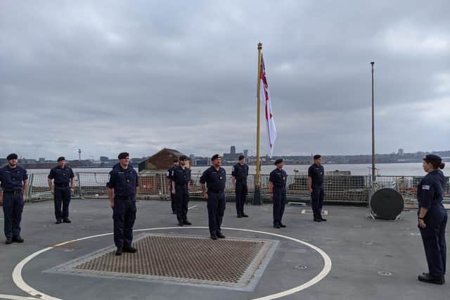 Crew of HMS Dauntless falls silent to mark anniversary of VE Day. Picture: HMS Dauntless