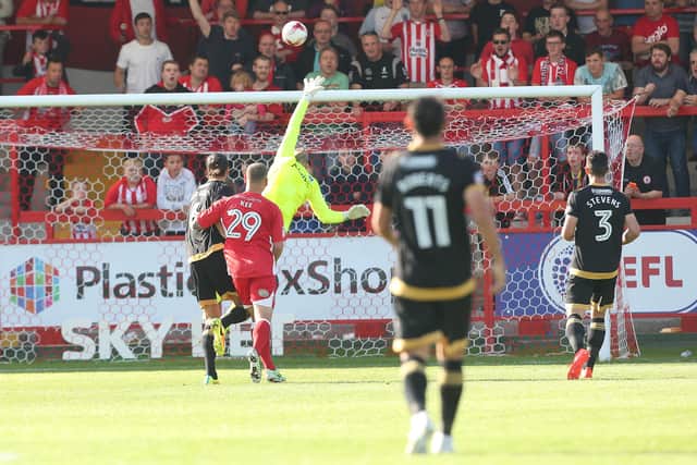Paddy Lacey scores his long-range goal against Pompey in 2016. Photo by Joe Pepler/Digital South.
