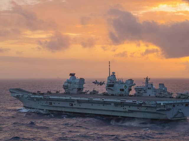 Pictured: An F-35B Jet from VMFA-211 lands back on HMS Queen Elizabeth whilst she conducts a double replenishment with RFA Tidespring and HNLMS Evertsen.