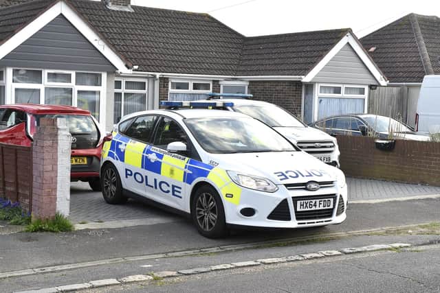 Police at the home in The Crossway, Portchester last week Picture: Sarah Standing (180423-2107)