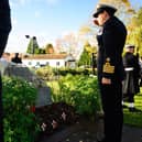 Captain Davey laying a wreath.