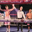 Liam Wiseman is declared the points winner against Berman Sanchez and has his had raised on South Parade Pier