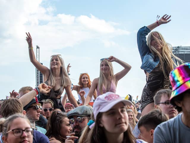 The crowd enjoying Annie Mac's  DJ set on the Common Stage. Picture: Vernon Nash (290821-212)