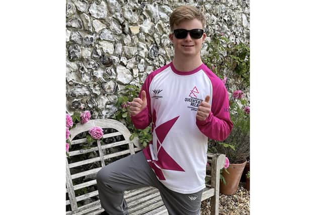 Max Ross in his batonbearer shirt