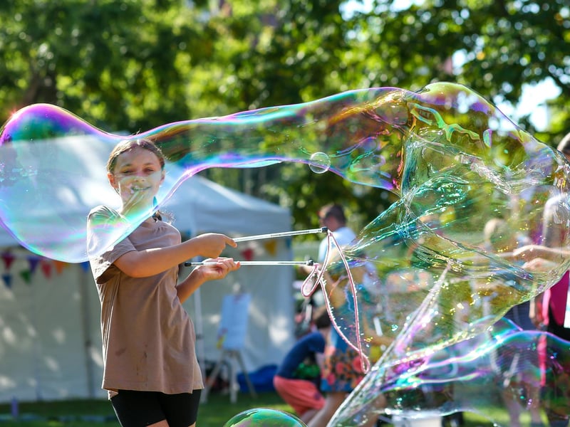 Isabella, 11, has fun making a giant soap bubble at a Suicide awareness event in Victoria Park, Portsmouth
Picture: Chris Moorhouse (jpns 090923-06)