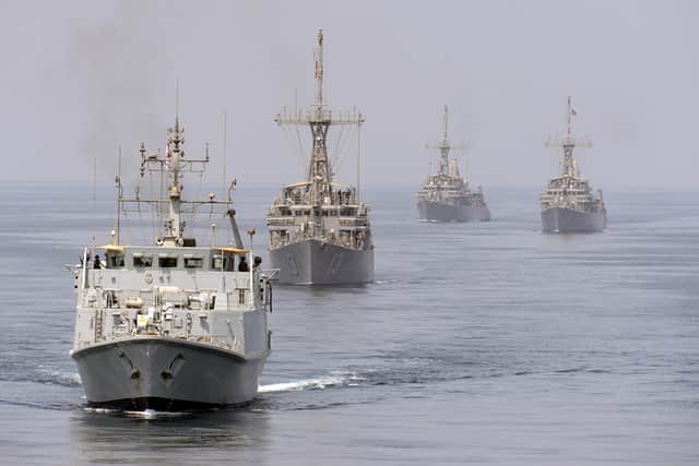 HMS Shoreham leads the way as Mine Countermeasure vessels fall into line astern of RFA Cardigan Bay, followed by USS's Sentry, Devastator and Dextrous..
