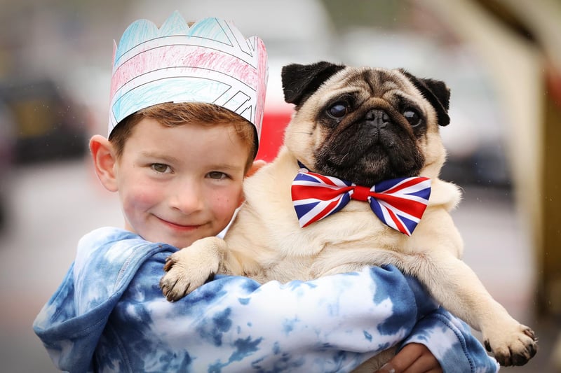 Hugo Fleming, six, and his dog Albert at the Meon Road street party for King Charles III's coronation (jpns 060523-17)
