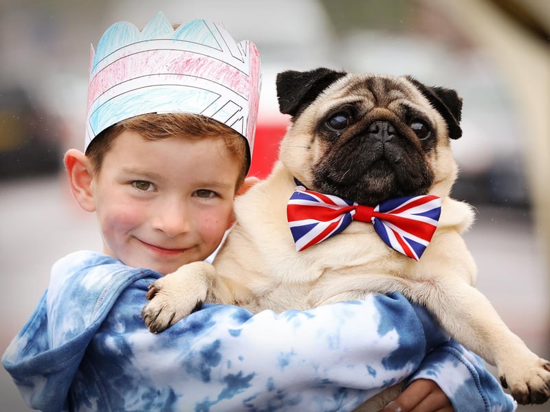 Hugo Fleming, six, and his dog Albert at the Meon Road street party for King Charles III's coronation (jpns 060523-17)