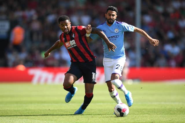 Jordon Ibe battles for possession with Manchester City's Riyad Mahrez last August. Now the Cherries winger could be set to face Moneyfields in the Hampshire Senior Cup. Photo by Shaun Botterill/Getty Images.