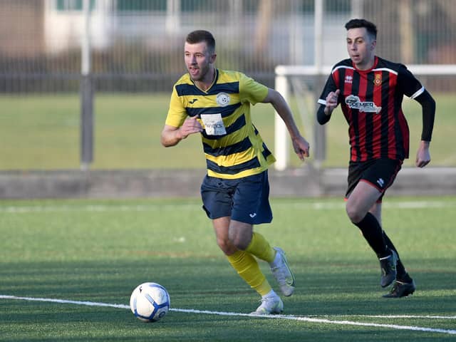 Ashton Leigh on his way to scoring his second goal for Paulsgrove against Fleetlands.

Picture: Neil Marshall