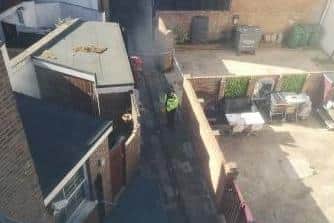 Police in an alleyway in Clarendon Road Southsea. Picture taken Sunday, August 30.