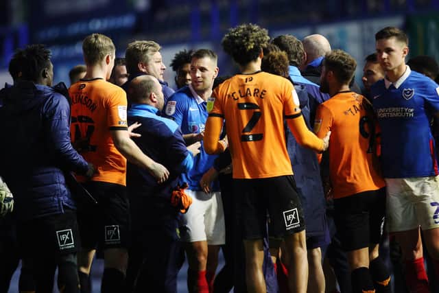 Fracas after the final whistle of Pompey's draw with Oxford on Tuesday. Picture: Joe Pepler
