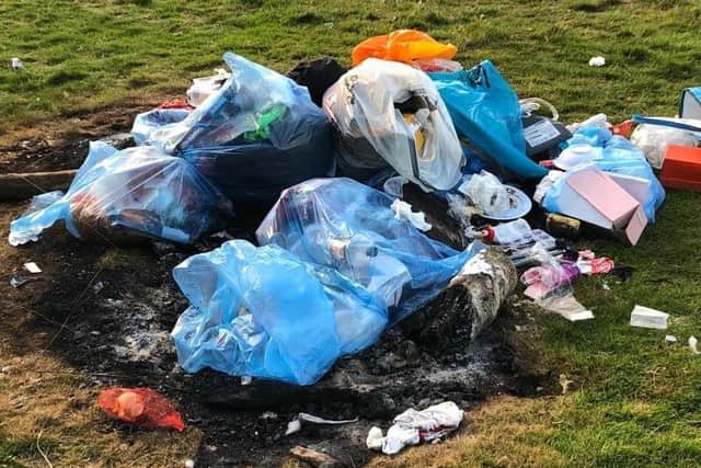 Rubbish left at an illegal camp set up by travellers in Hampshire