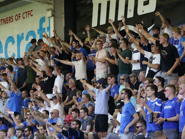 The Pompey chimes rang out across Whaddon Road after the Blues went ahead in the first half.