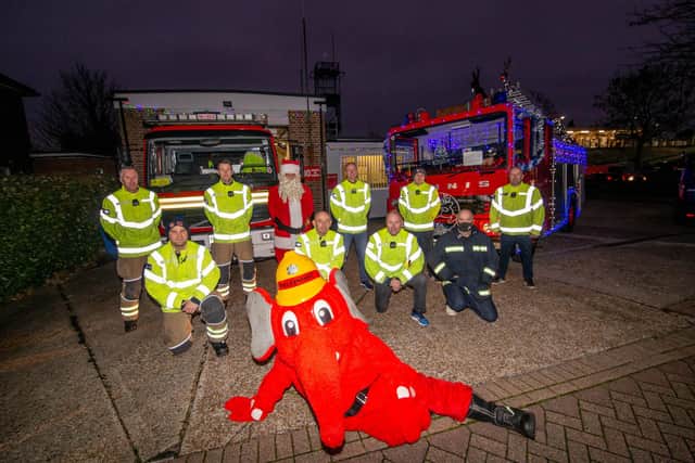 Portchester firefighters take out illuminated vintage engine to raise cash for The Fire Fighters Charity

Pictured: Portchester firefighters at Portchester fire station on Friday 17th December 2021

Picture: Habibur Rahman