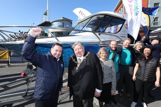 From left, Ross Honey, Lord Mayor of Portsmouth Cllr Frank Jonas, Lady Mayoress Joy Maddox, James Donougher, Richard Soutar, Karen Clarke and Juliet Boyles. Launch of Sea Angling Classic competition at Gunwharf Quays, Portsmouth. This is the boat offered as a prize
Picture: Chris Moorhouse (jpns 190322-33)
