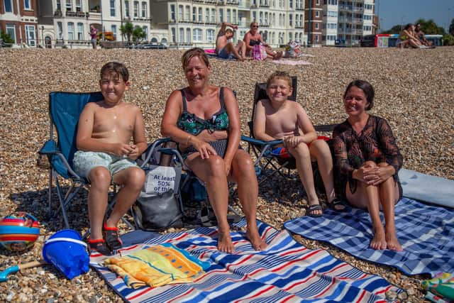 Pictured: Bailey 10, Lorraine Clark, Kellie McGee and
Harrie 10 on Southsea beach.
Picture: Habibur Rahman