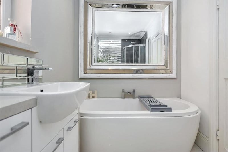 The family bathroom from a different angle. Bet you can't wait to make a splash in the tub!