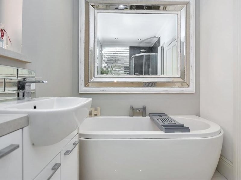 The family bathroom from a different angle. Bet you can't wait to make a splash in the tub!