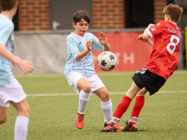 Action from the Portsmouth Youth League Geldard Invitation Cup final between Jubilee 77 U13s and Castle United U13s (light blue and white kit). Picture: Keith Woodland (190321-813)