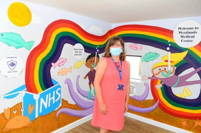 Westlands Medical Centre in Portchester, have had a mural designed and created for them by pupils at Portchester Community School. Pictured is: Jackie Dalby, practice manager. Picture: Sarah Standing (110820-2490)