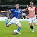 Chesterfield's Liam Mandeville tries to get the better of Jack Sparkes. Picture: Nigel French/PA Wire