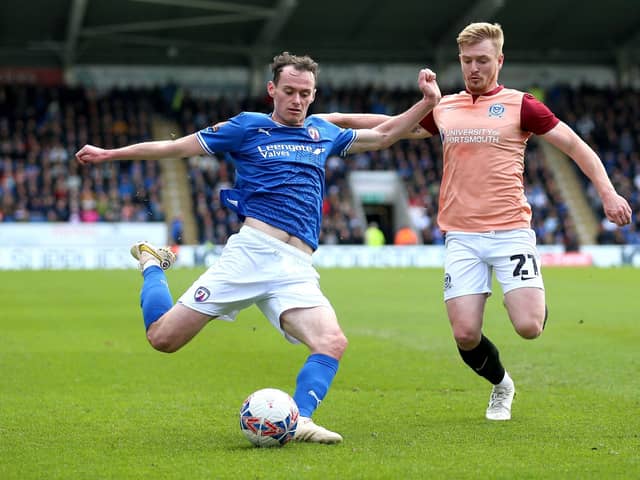 Chesterfield's Liam Mandeville tries to get the better of Jack Sparkes. Picture: Nigel French/PA Wire