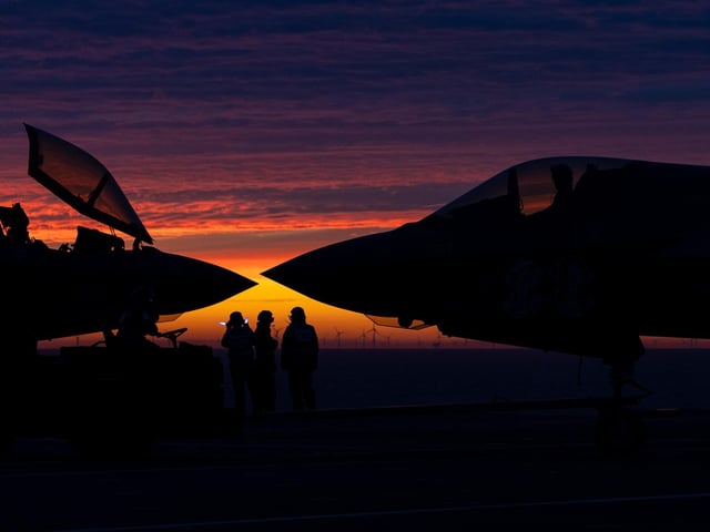 F-35B Lightning Jets from 617 Squadron, RAF Marham, prepare for night flying training exercises whilst on Operation Achillean. HMS Queen Elizabeth was at the centre of the Carrier Strike Group, with the Commander UK Carrier Strike Group, Commodore Angus Essenhigh OBE Royal Navy and his staff commanding from the aircraft carrier.Photographer: AS1 Natalie Adams