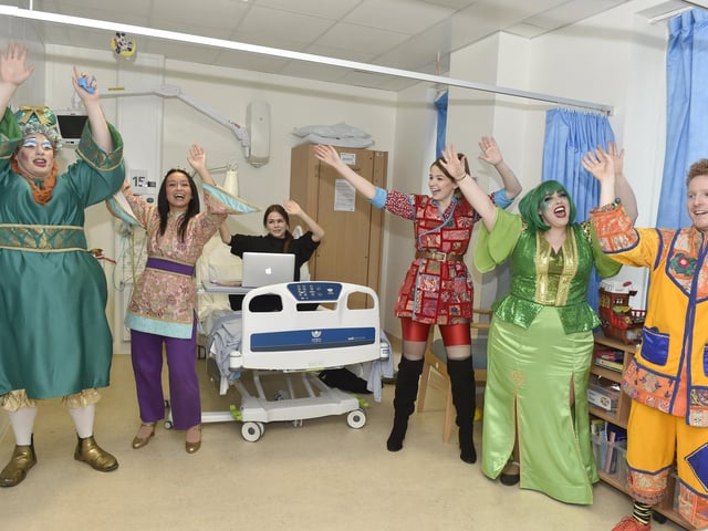 Pictured is: (middle) Phoebe Sizer (16) joins in with the panto cast.