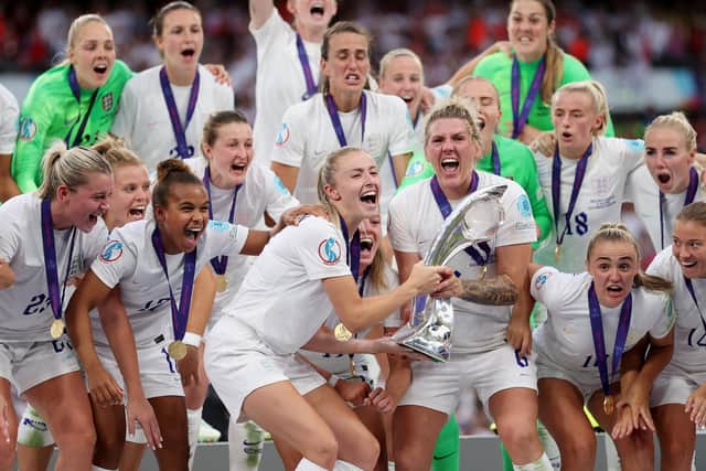 The England team lifting the UEFA Women's EURO 2022 Trophy (Photo by Naomi Baker/Getty Images)