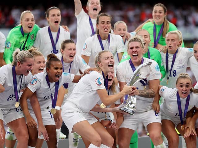 The England team lifting the UEFA Women's EURO 2022 Trophy (Photo by Naomi Baker/Getty Images)