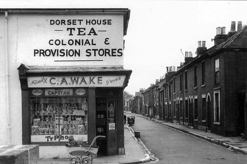 C A Wake,  Open all hours - the shop on the corner of Hampton Street and South Brighton Street, Southsea, in July 1965.