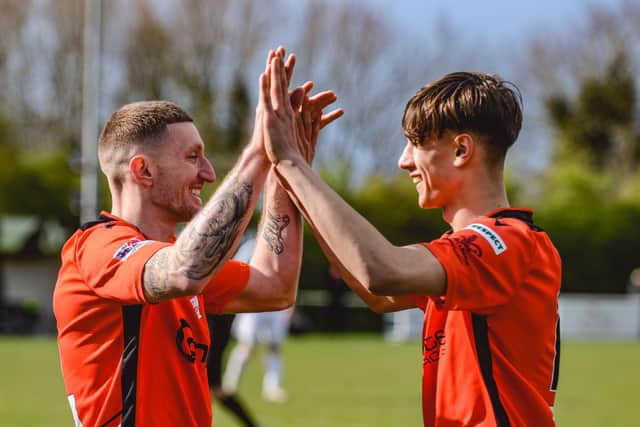 Archie Greenough, right, celebrates an AFC Portchester goal with Lee Wort last season. Picture by Daniel Haswell