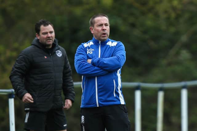 Denmead boss Paul Goddard, right, with Paulsgrove manager Wayne Grant on the touchline in a recent L4 Teamwear Challenge Cup group tie.
Picture: Chris Moorhouse