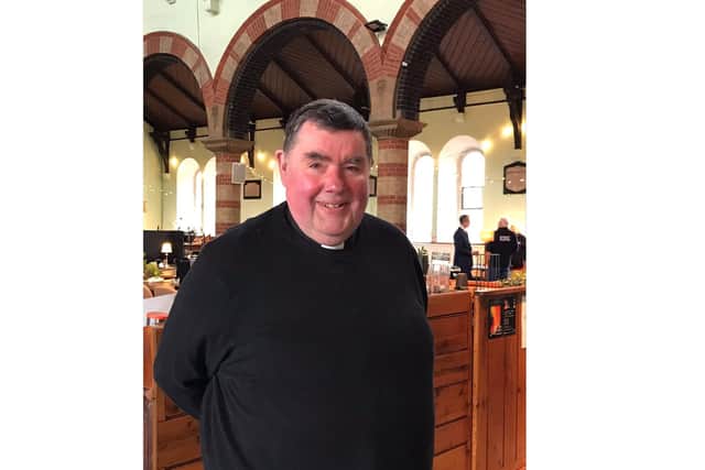 Revd Canon Bob White.