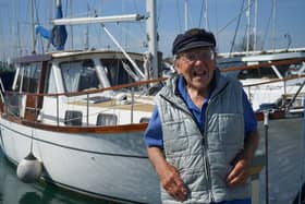 Maurice Owens, 97, lives onboard Old Possum in Haslar Marina. On Sunday, he will walk the 170m pier 26 times on Sunday, raising money for the NHS. Picture: Haslar Marina