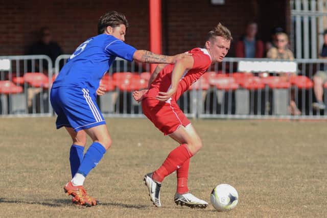 Horndean (red) v Shaftesbury. Picture by Martyn White