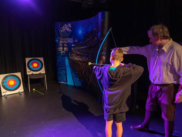Jesse Hodgkinson (9) in the archery area provided by the Mary Rose Museum. Picture: Mike Cooter (040223)