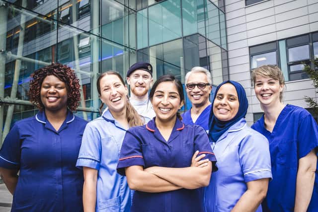 Nurses on the Ward follows nurses at QA Hospital in Portsmouth.
Left to right: Gamu Chakonda, Kat Sharp, Scott Weatherhead, Neil Sesbreno, Mahbuba Begum and Caroline McCrea, with Hazera Noory at the front.