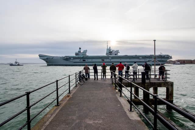 Crowds gather to watch HMS Queen Elizabeth leave Portsmouth
Picture: Habibur Rahman
