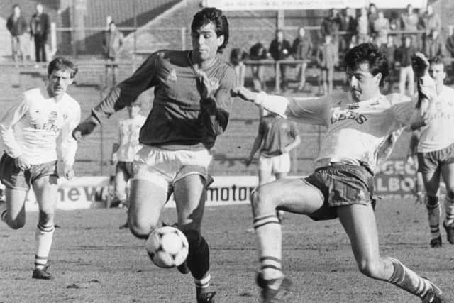 Neil Webb evades a challenge during the 5-1 win over Oldham in February 1985