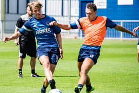 Snorre Nilsen challenges Kal Naismith during the pre-match warm-up at the Hawks in July 2015. Picture: Colin Farmery