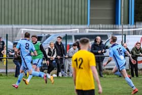 Brett Pitman, far left, wheels away after scoring Portchester's late, late winner at Hamble. Picture by Daniel Haswell