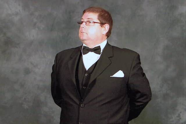 Part-time entertainer Andy George who performed a gig in his driveway to raise cash for the NHS and QA.