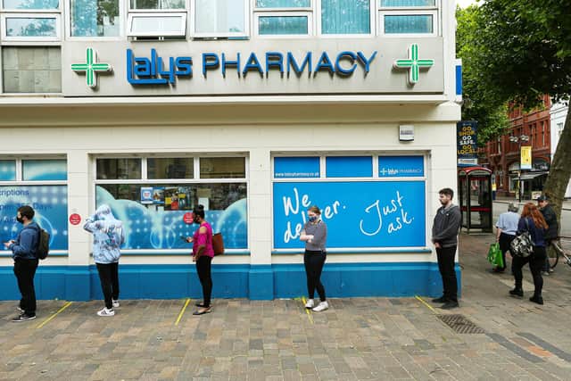 The queue at the Covid-19 Vaccination Centre at Lalys Pharmacy, Guildhall Walk, PortsmouthPicture: Chris Moorhouse (jpns 100621-10)