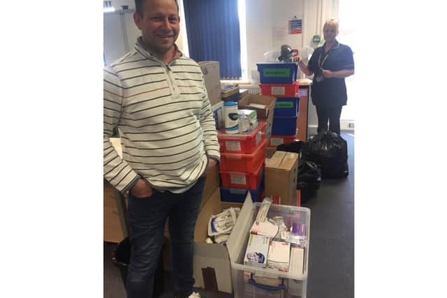 Darren Sharkey, who coordinated the donations, with PPE supplies contribute by colleges across Hampshire.