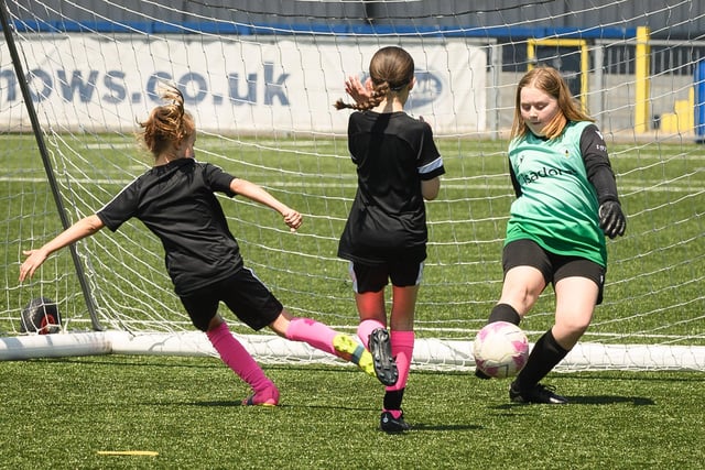 Girls' football action from the Havant & Waterlooville Summer Tournament. Picture: Keith Woodland (030621-33)