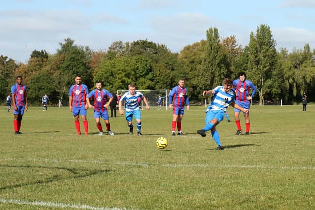 Copnor's Brad Hartill fires a penalty wide during his side's 1-0 Portsmouth & District FA Sunday Intermediate Trophy win against Saturn Royale. Pic: Kevin Shipp.
