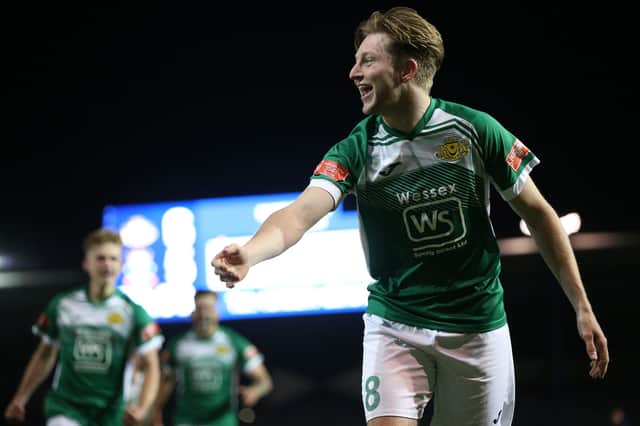 Moneyfields' Marley Ridge celebrates his winning penalty in the Portsmouth Senior Cup final shoot-out against Baffins. Picture: Chris Moorhouse