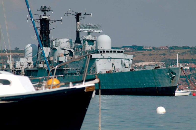 HMS Cardiff with Portchester shore behind. Picture: Trevor Evans, © Hampshire County Council Museum Service.